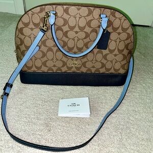 Authentic Coach purse. Dark blue, light blue and brown.  In excellent condition.